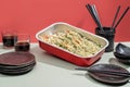 TEMPURA food tray with drinks and chopsticks isolated on grey background side view Royalty Free Stock Photo