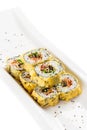 Tempura maki sushi - deep fried hot sushi roll with salmon, tuna Royalty Free Stock Photo