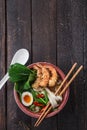 Tempura shrimps with asian noodle soup in a bowl Royalty Free Stock Photo