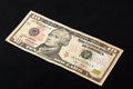 Ten american dollars on a black background Royalty Free Stock Photo