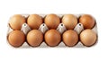 Ten brown eggs in a carton package isolated in white background. File contains clipping path Royalty Free Stock Photo