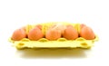 Ten chicken eggs in yellow box Royalty Free Stock Photo