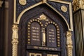 Ten commandments in Hebrew and David Star carved on wood in synagogue, close up