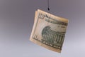 Ten dollar bill on gray background. Arnings with minimal investment