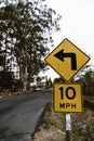 Ten mile per hour roadside sign in a rural place