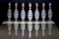 Ten pin bowling alley background. Closeup of tenpin row on a lan