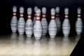 Ten pin bowling alley background. Closeup of tenpin row on a lan