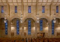 Ten Stained glass windows and lighting inside Christ the King Catholic Church in Dallas, Texas.