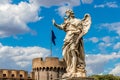 Statue of an angel on the background Castle Sant`Angelo and flag of european union, Rome, Italy Royalty Free Stock Photo