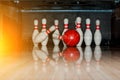 Ten white pins in a bowling alley with ball hit Royalty Free Stock Photo