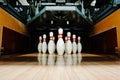 Ten white pins in a bowling alley lane Royalty Free Stock Photo