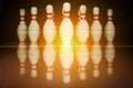 Ten white pins in a bowling alley lane Royalty Free Stock Photo