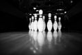 Ten white pins in a bowling alley lane Royalty Free Stock Photo