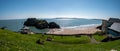 TENBY,SOUTH WALES APRIL 2021-Panorama View of Tenby beach Wales uk in summer with tourists and visitors, blue sea and