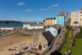 Tenby town Pembrokeshire in summer with holidaymakers and visitors and blue sky