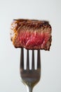 Tender beef slice on fork, isolated and cut out, on a transparent background, stock image Royalty Free Stock Photo