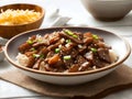 Tender Beef Teriyaki on top white steamy rice