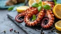Tender grilled octopus on black plate, a timeless mediterranean culinary delight