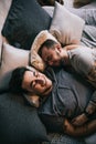 Positive delighted non-traditional couple sleeping together Royalty Free Stock Photo