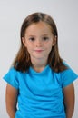 Tender schoolgirl with blue shirt Royalty Free Stock Photo
