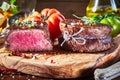Tender medium rare beef fillet steak medallions