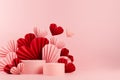 Tender pastel pink stage mockup with two round podiums, fly passion red and pink paper hearts of asian fans in chinese style. Royalty Free Stock Photo