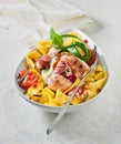 Tender pork fillet wrapped in ham served on pasta Royalty Free Stock Photo