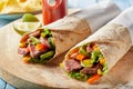 Tender roasted entrecote beef steak wraps Royalty Free Stock Photo