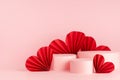 Tender soft light pastel pink stage mockup with three round podiums, passion red paper hearts of asian fans in chinese style. Royalty Free Stock Photo