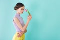 tender teen girl posing with tulip flower