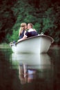 Tender teenagers kissing on the boat