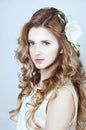 Tender young woman with long curtly blond hair Royalty Free Stock Photo