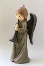 Statue child angel with trumpet Royalty Free Stock Photo