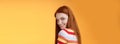 Tenderness, romance, seduction concept. Attractive cheeky flirty young redhead daring girl turn behind look shoulder Royalty Free Stock Photo