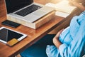 Tending to business before baby arrives. a pregnant woman using a laptop while working from home.