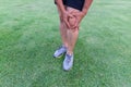 Tendon knee joint problems on Man leg from exercise Royalty Free Stock Photo