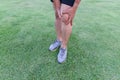 Tendon knee joint problems on Man leg from exercise