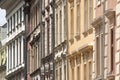Tenement houses / town house windows street urban background. Cracow, Poland and polish architecture concept, view, daytime Royalty Free Stock Photo