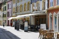 Tenements and sidewalk cafe