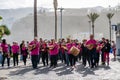 Tenerife, Spain - December 15, 2019: A group of musicians walking a street and making music on the streets of Puerto de