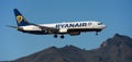 Tenerife, Spain December 9st, 2023. Boeing 737-8AS Ryanair Airlines flies in the blue sky