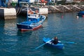 TENERIFE, SPAIN/EUROPE - FEBRUARY 25 : Man rowing a fishing boat