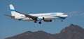 Enter Air Airlines flies in the blue sky. Landing at Tenerife Airport Royalty Free Stock Photo