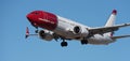 Tenerife, Spain January 17 st, 2024. Boeing 737 MAX 8 Norwegian Airlines flies in the blue sky
