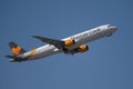 Tenerife, Spain 14.02.2019 Thomas Cook Airbus 321 aircraft flying in the blue sky