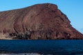 Tenerife, Tejita Beach and Montana Roja   clear volcanic rock texture to red volcanic sand Royalty Free Stock Photo