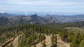 Forest and rugged volcanic landscape as seen from Pico del nieves in Gran Canaria