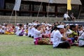 Villagers gather for prayers ahead of the annual Perang Pandan festival in the Balinese Royalty Free Stock Photo