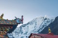 Tengboche Monastery roof traditional Tibetan Buddhism decoration with Kangtega 6782m mountain peak on the background. Sagarmatha Royalty Free Stock Photo