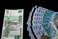 Tenge, Kazakhstan and the Russian ruble. Exchange rate. Bank, world economy, crisis, Finance. Dollar rate. Banknotes of different